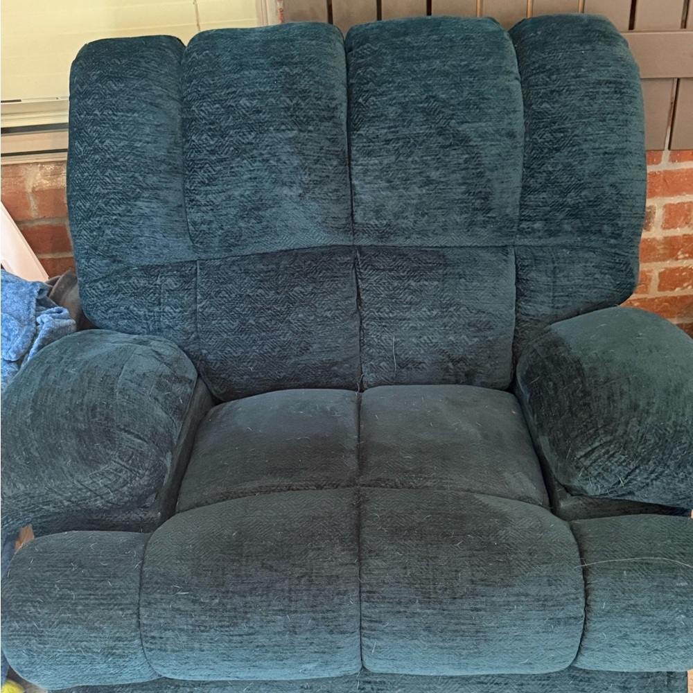 Beautiful rarely used Teal rocker recliner.
